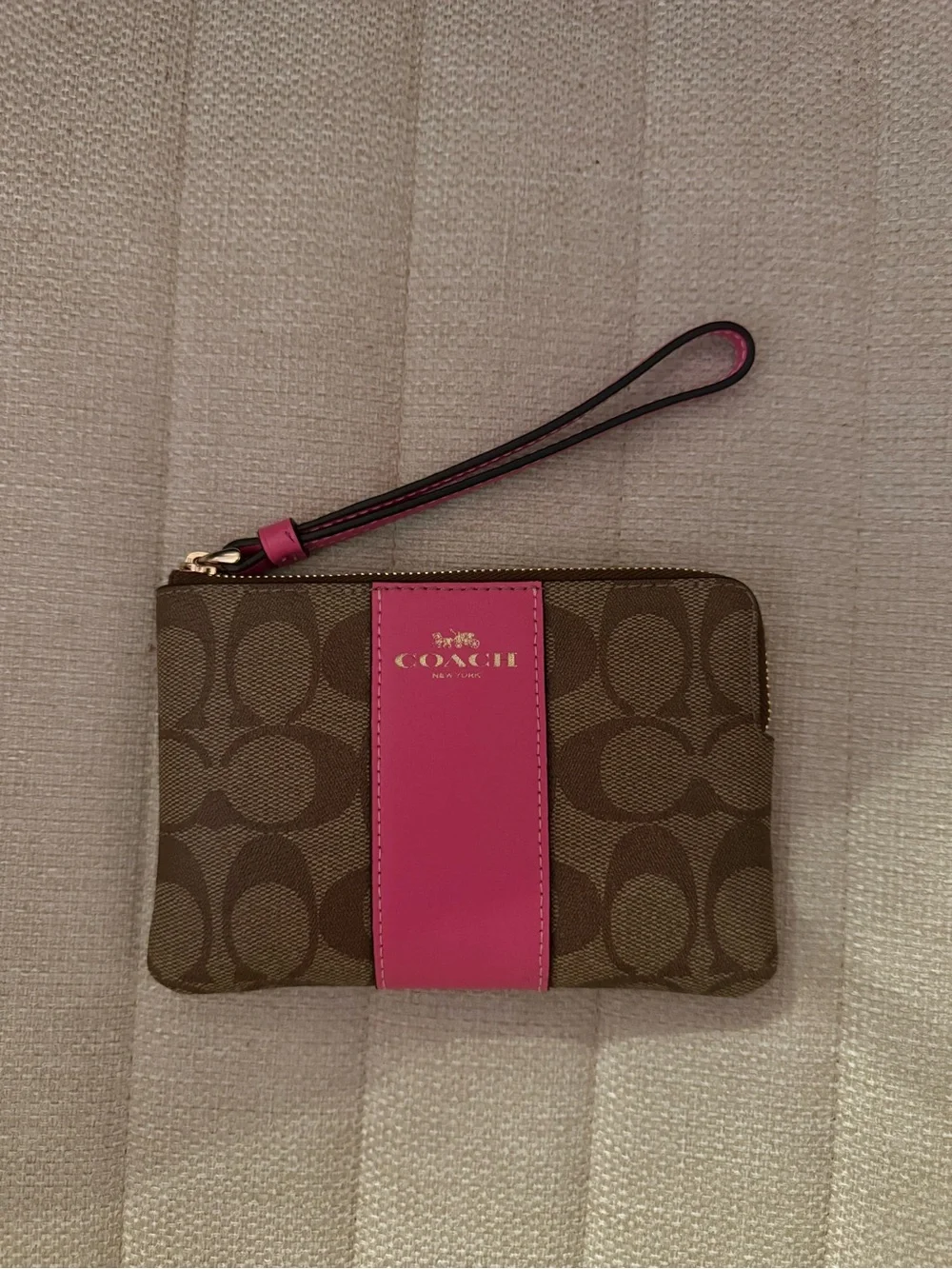 Coach Brown Signature Canvas Wristlet with Pink Center Stripe